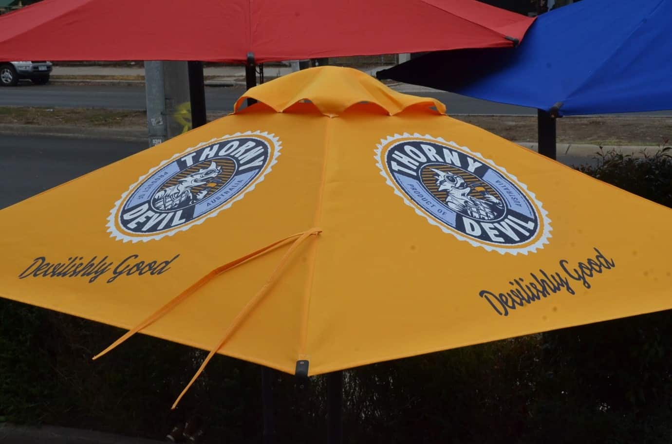 Yellow Market Umbrella with marketing